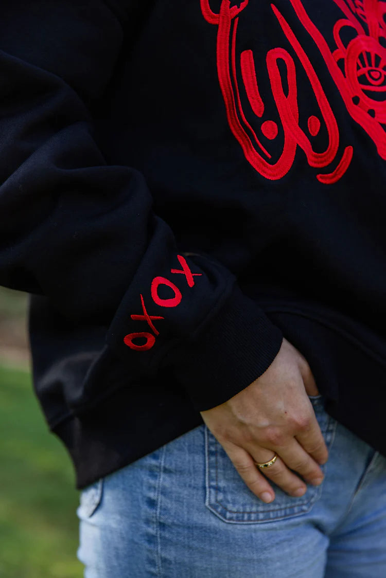 Embroidered Black Woof Crewneck